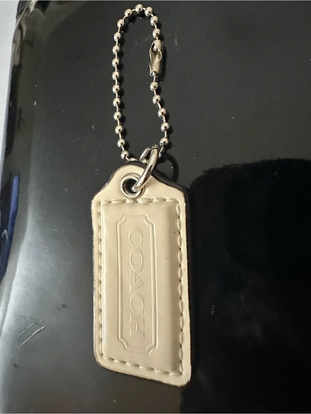 COACH Leather Hangtag | Bag Charm in Cream with Embossed Logo